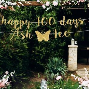“Happy 100 Days” banner in gold, glittery lettering